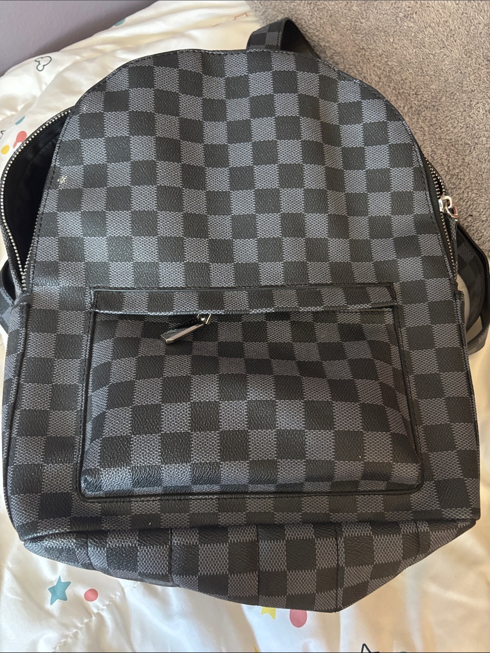Checkered backpack black and gray